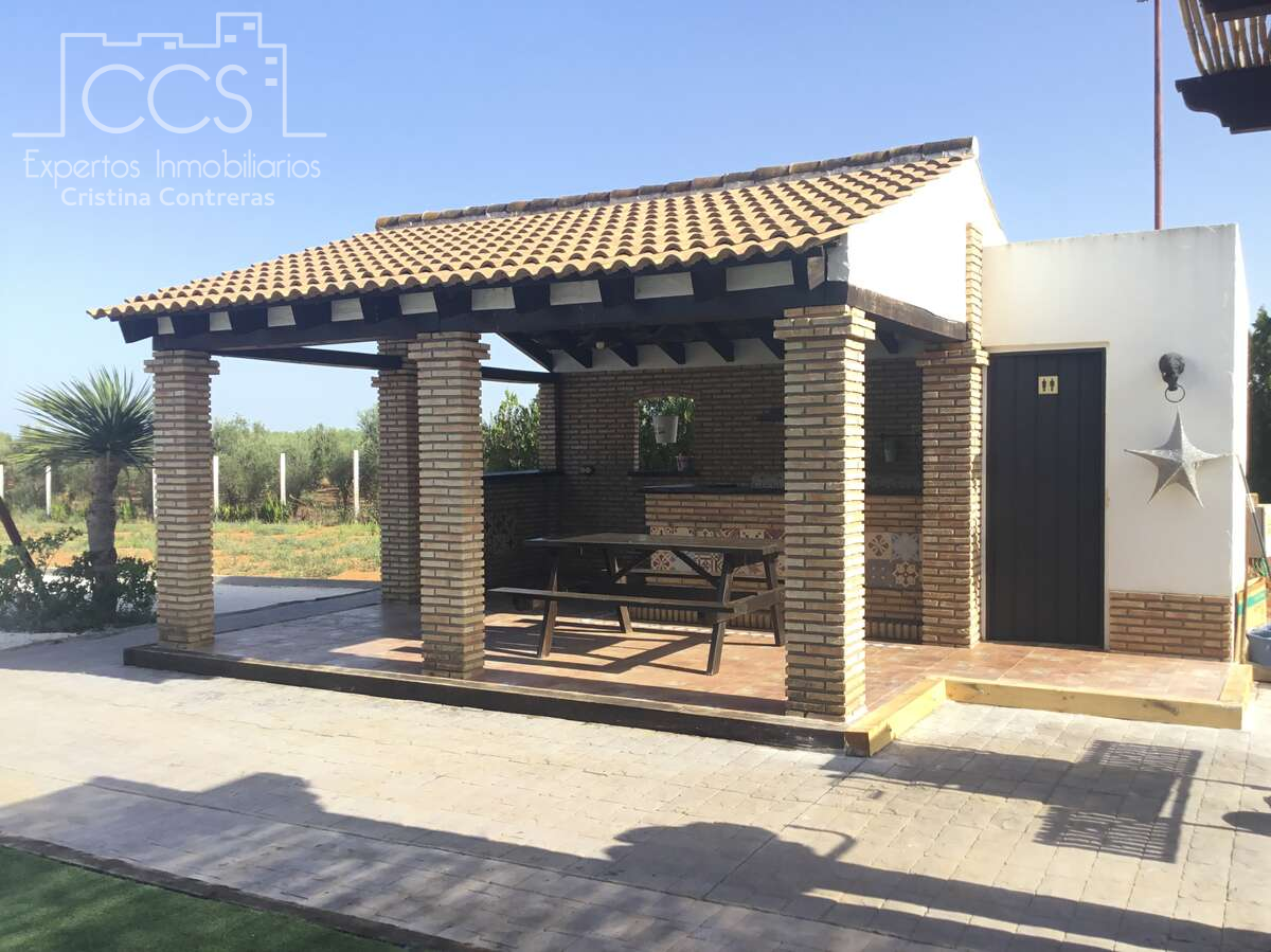 Terrace of Country house for sale in Pilas  with Air Conditioner, Storage room and Swimming Pool
