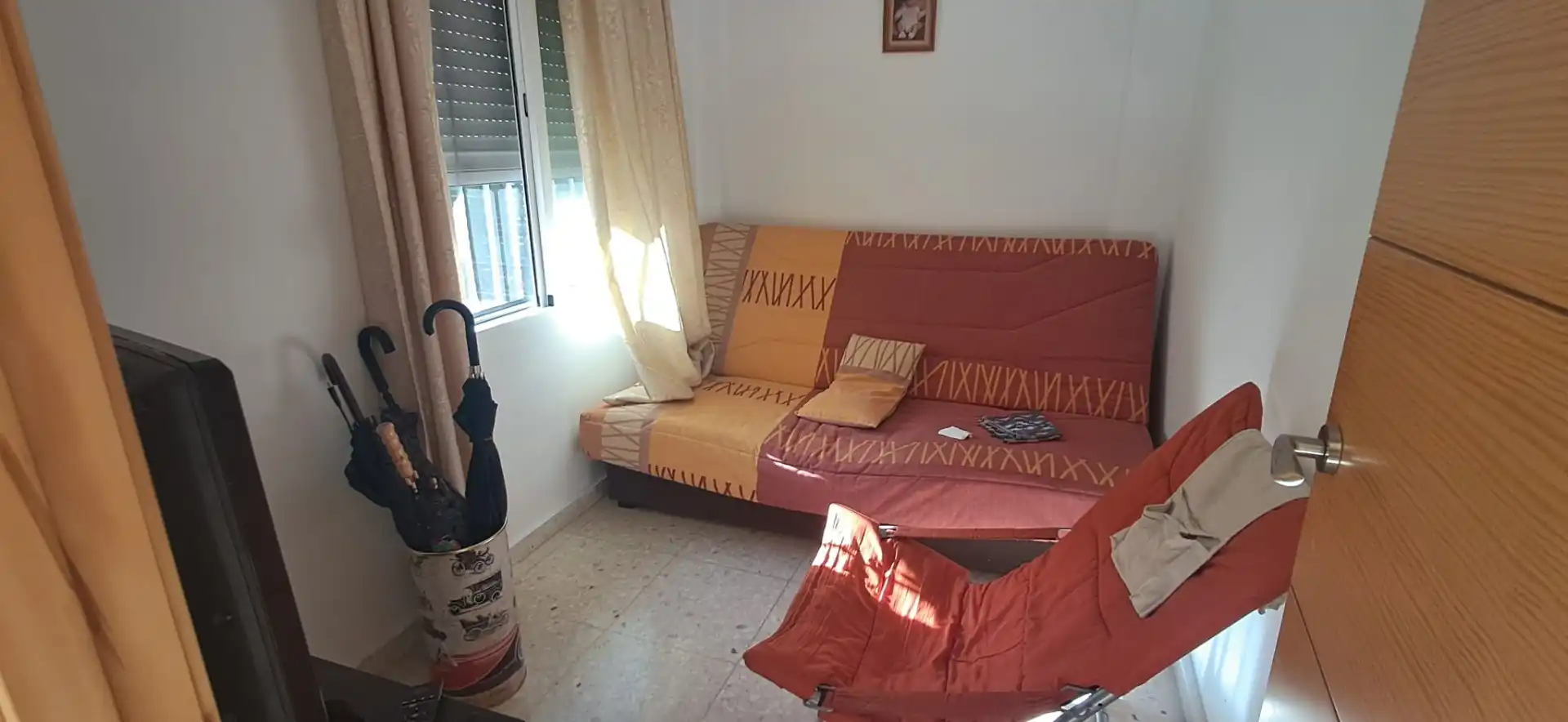 Sala d'estar de Casa adosada en venda en Utrera amb Aire condicionat, Traster i Moblat