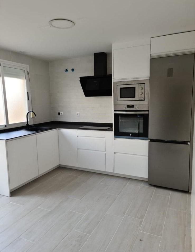 Cocina de Casa adosada en venta en Cáceres Capital con Aire acondicionado, Calefacción y Terraza