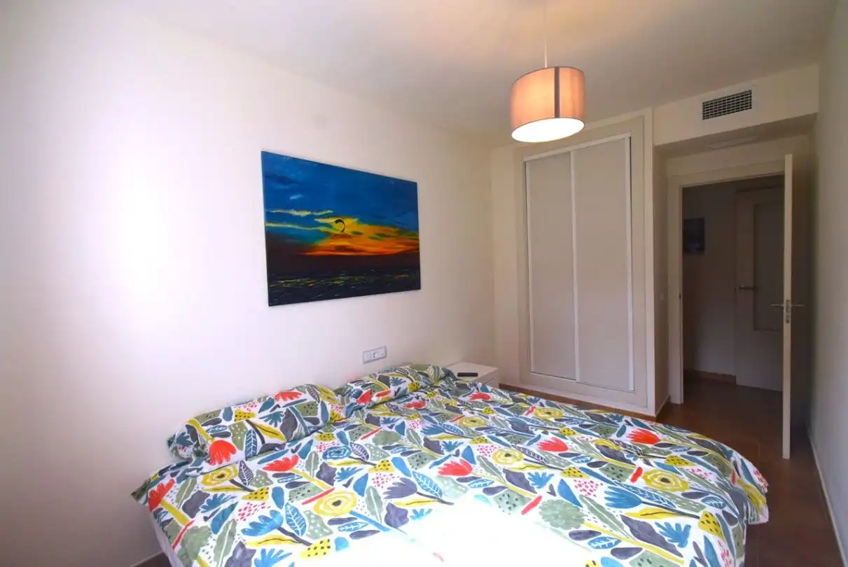 Dormitori de Apartament de lloguer en La Alcaidesa amb Aire condicionat, Calefacció i Jardí privat