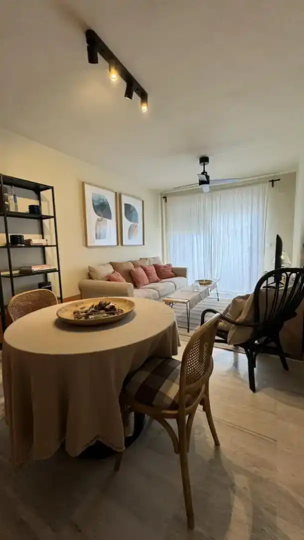 Sala d'estar de Pis de lloguer en Polopos amb Rentadora, TV i Piscina comunitària