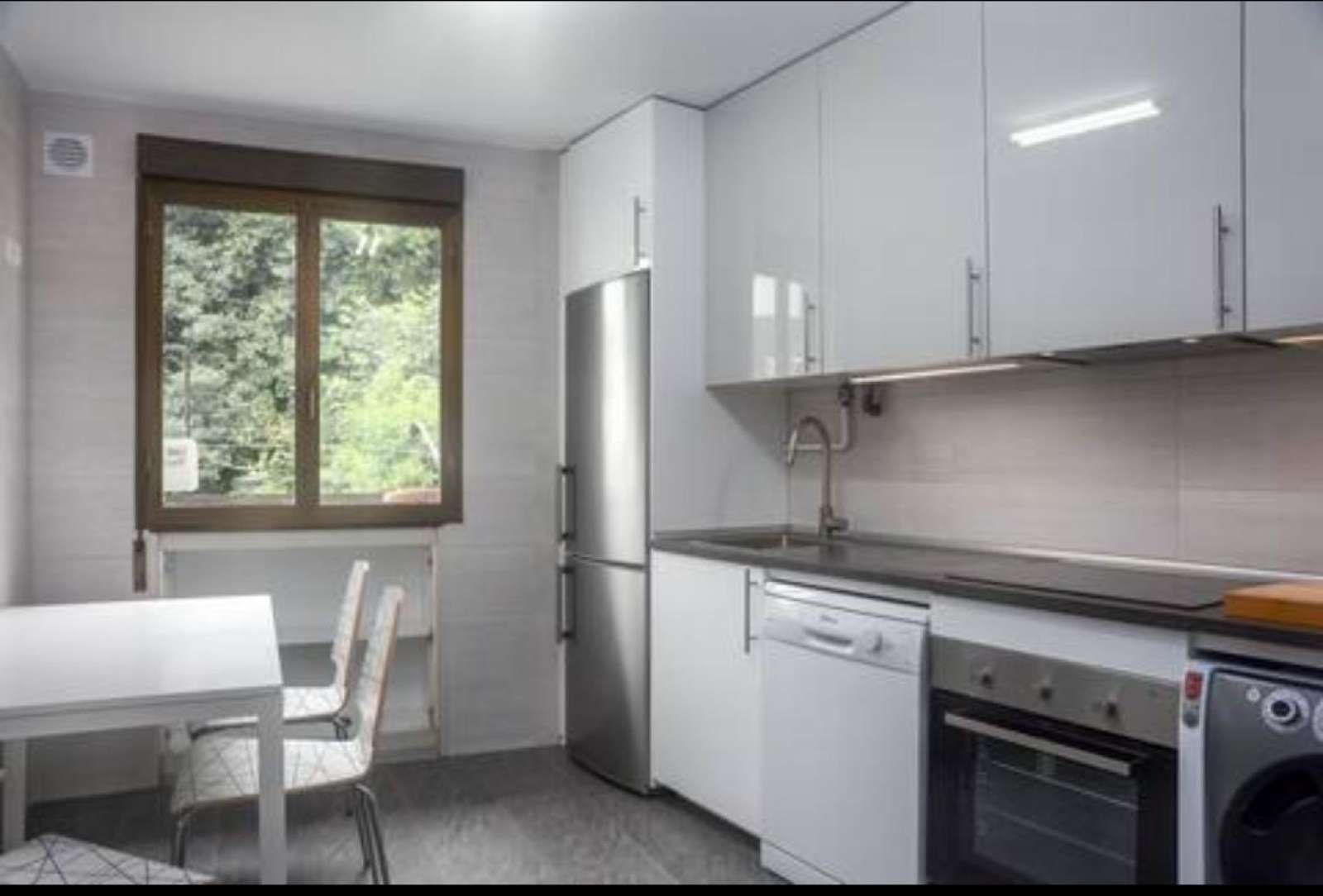 Cuina de Apartament per a compartir en Donostia - San Sebastián  amb Aire condicionat, Calefacció i Terrassa