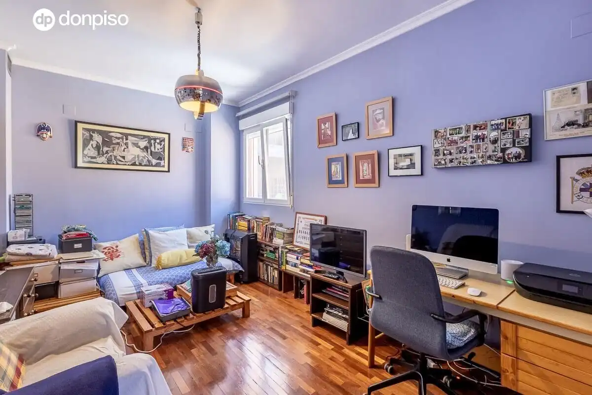 Sala d'estar de Casa adosada en venda en Granada amb Aire condicionat i Terrassa