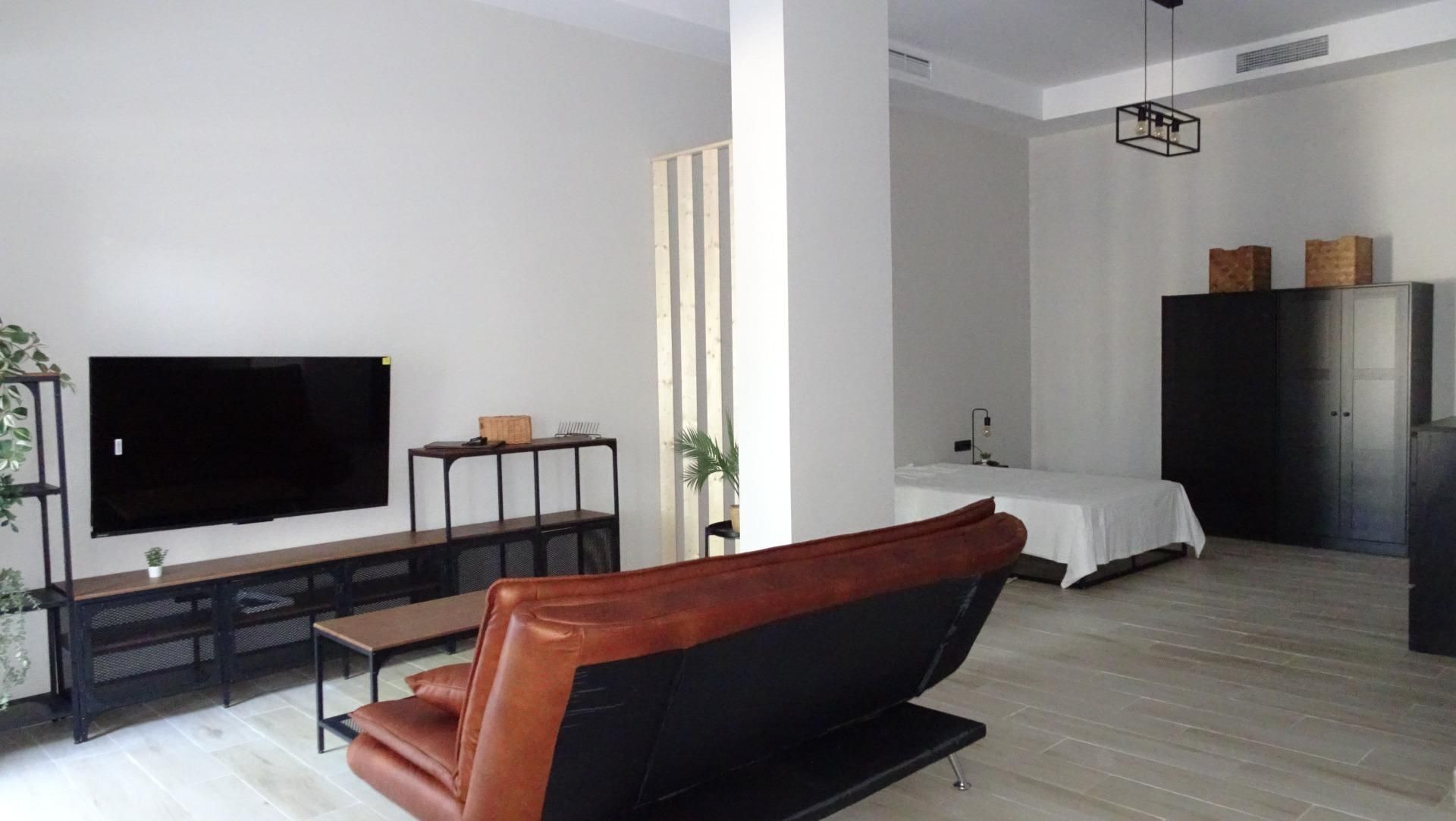 Living room of Study for sale in  Sevilla Capital  with Air Conditioner, Private garden and Terrace