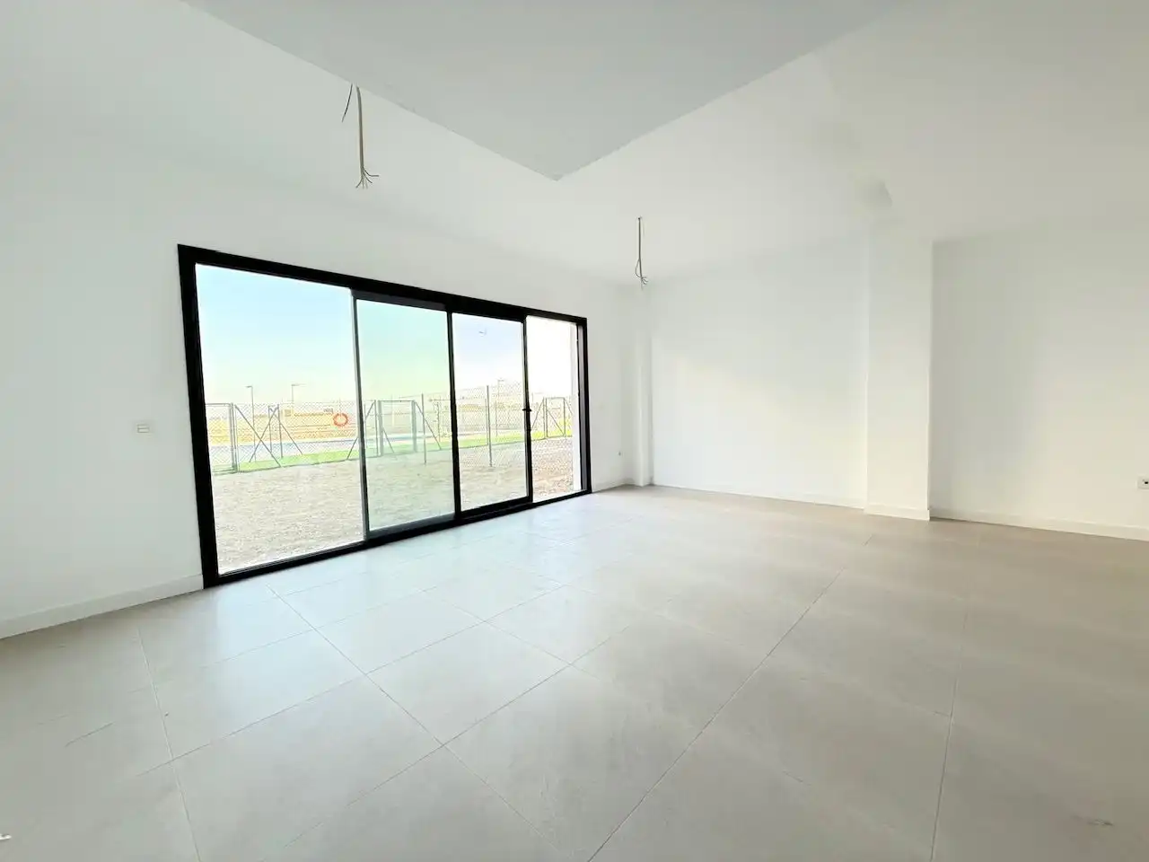 Sala de estar de Casa adosada en venta en Vélez-Málaga con Jardín privado y Piscina comunitaria