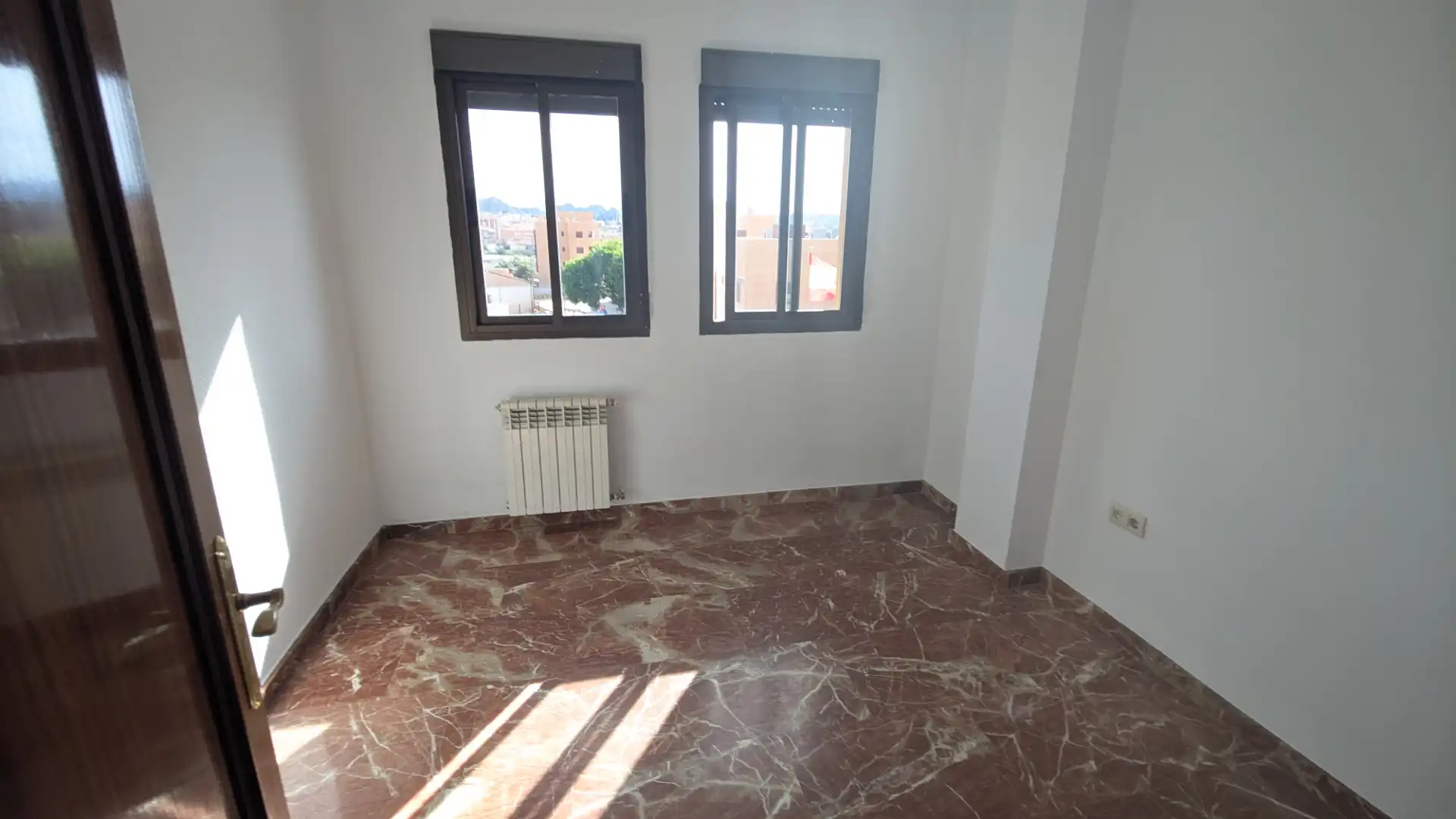 Habitación de Casa adosada en venta en Guadix con Calefacción