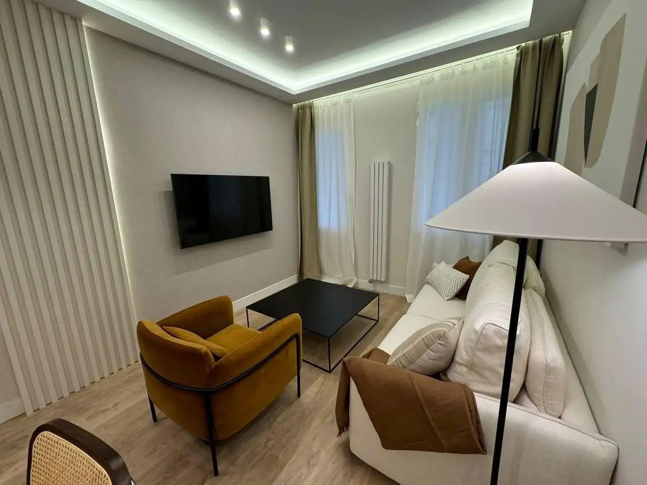 Sala d'estar de Pis de lloguer en Madrid amb Aire condicionat i Moblat