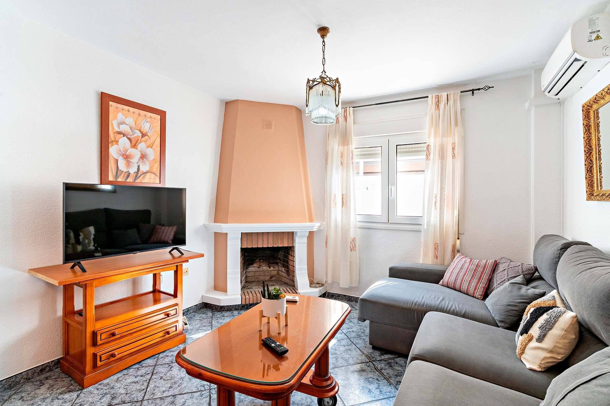 Sala d'estar de Casa adosada en venda en  Almería Capital amb Aire condicionat, Terrassa i Balcó