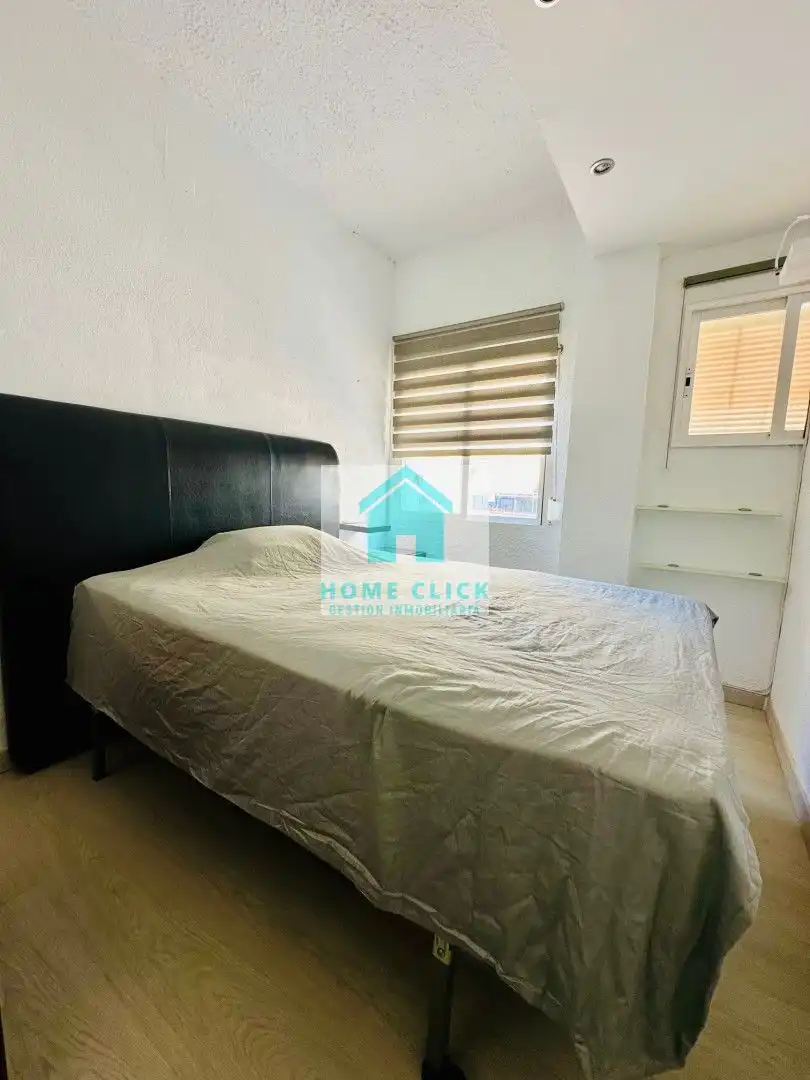 Dormitori de Apartament de lloguer en Mont-roig del Camp amb Aire condicionat, Calefacció i Jardí privat