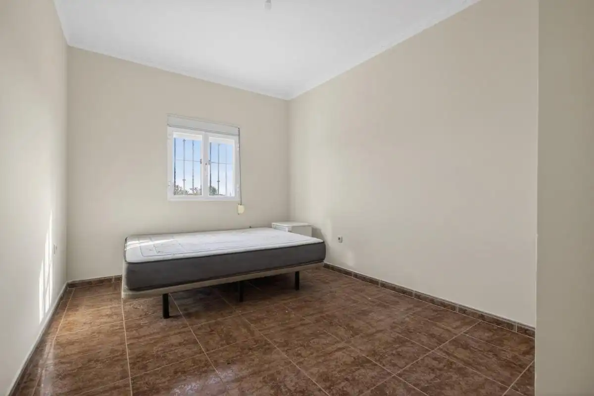 Habitación de Finca rústica en venta en La Rinconada con Calefacción, Jardín privado y Terraza