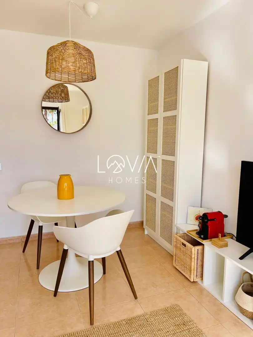 Sala d'estar de Apartament de lloguer en La Oliva amb Terrassa, Piscina i Piscina comunitària