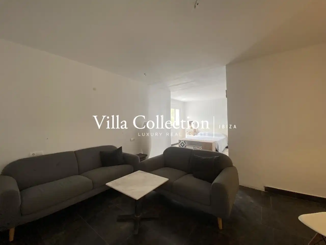 Wohnzimmer von Einfamilien-Reihenhaus zum Verkauf in Sant Josep de sa Talaia mit Privatgarten, Terrasse und Schwimmbad
