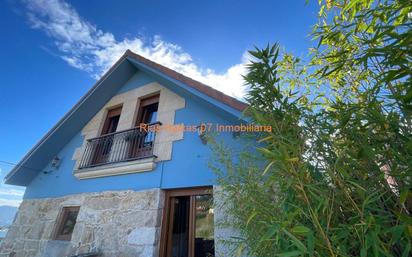 Vista exterior de Casa o xalet en venda en Mos amb Calefacció, Jardí privat i Terrassa