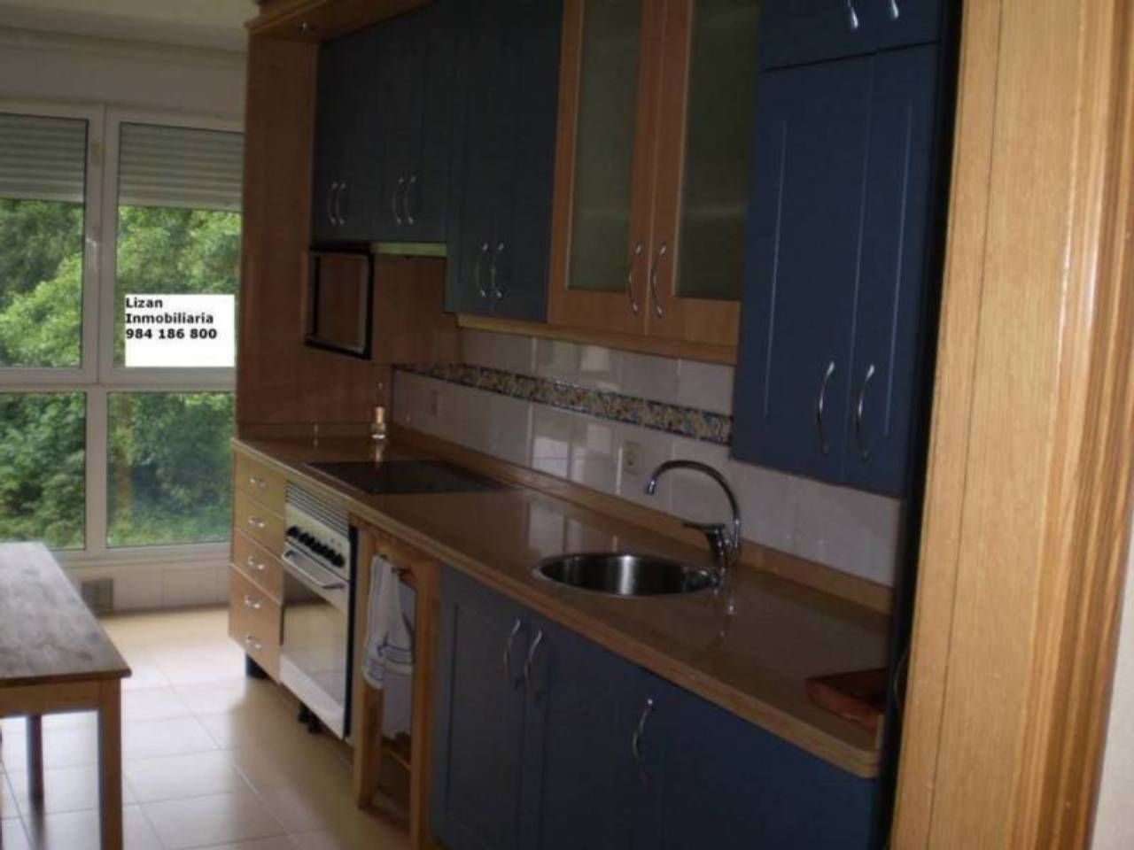 Kitchen of Flat for sale in Oviedo   with Heating and Storage room