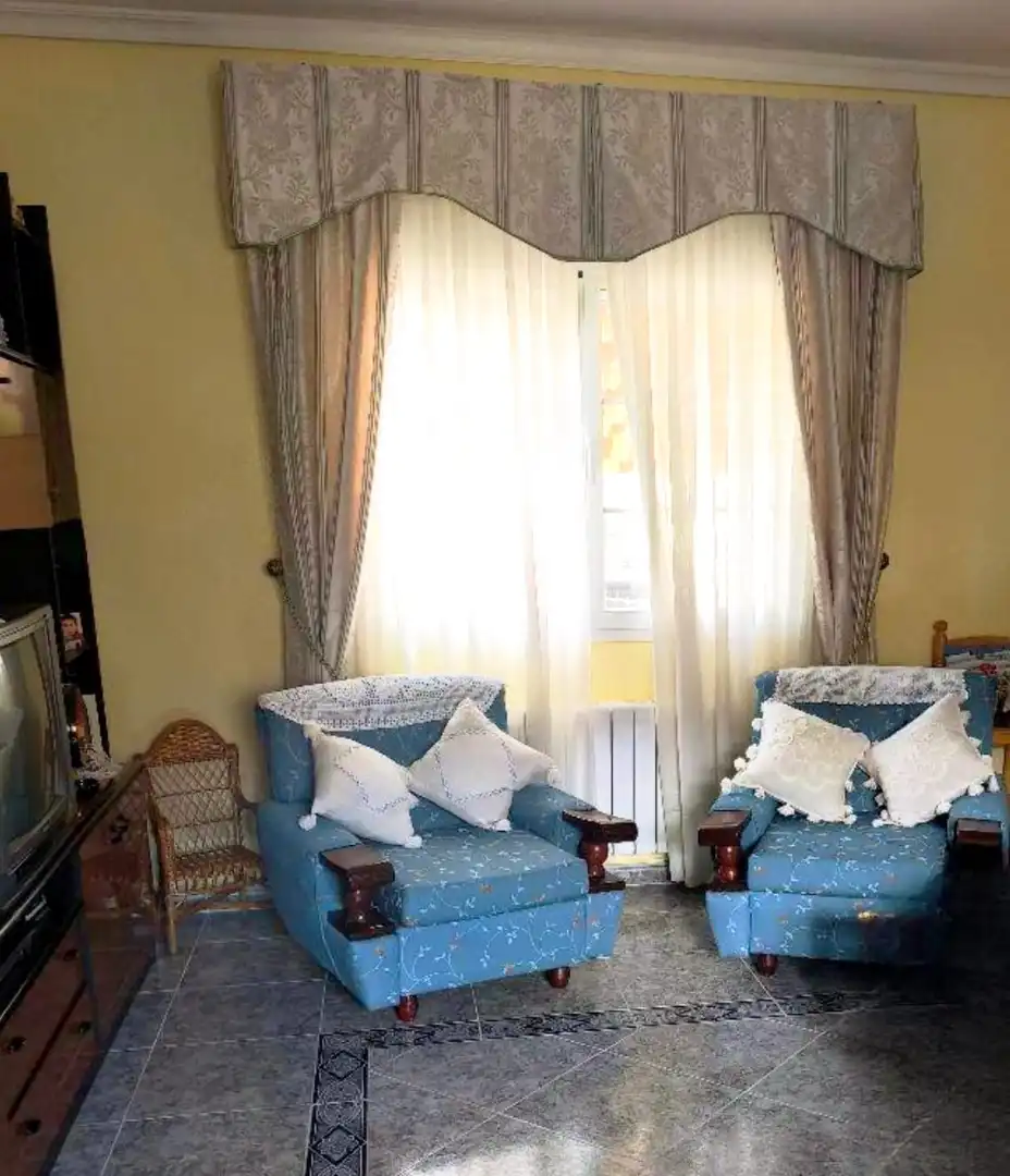 Sala d'estar de Casa adosada en venda en Montearagón amb Aire condicionat i Calefacció