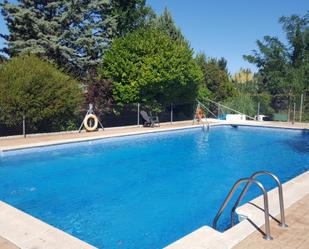 Swimming pool of Single-family semi-detached for sale in La Moraleja  with Air Conditioner and Terrace
