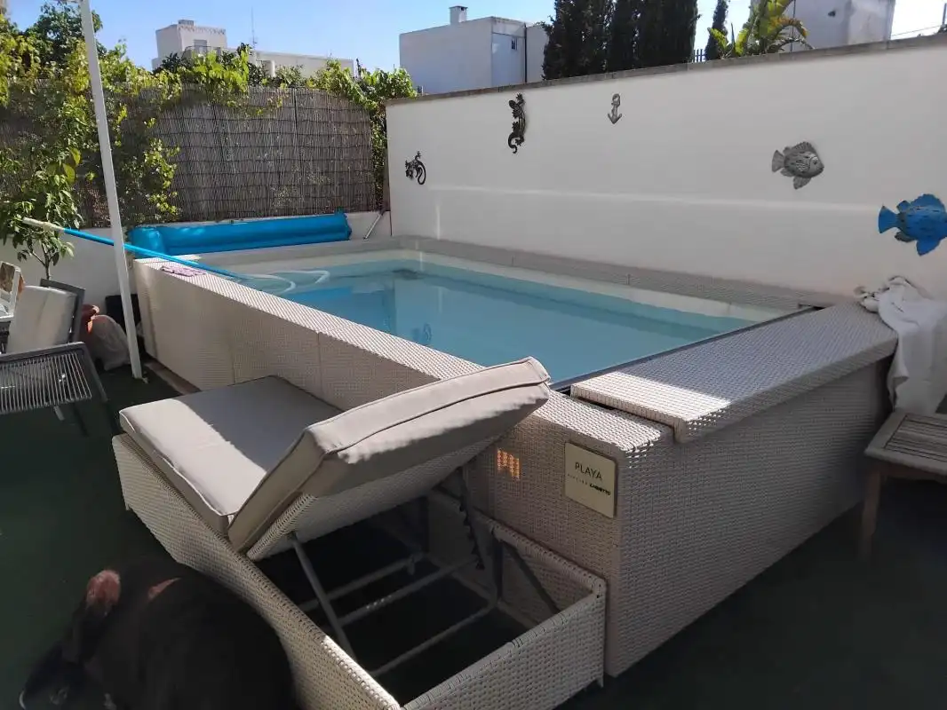 Piscina de Casa adosada en venda en Sant Antoni de Portmany amb Aire condicionat, Calefacció i Jardí privat