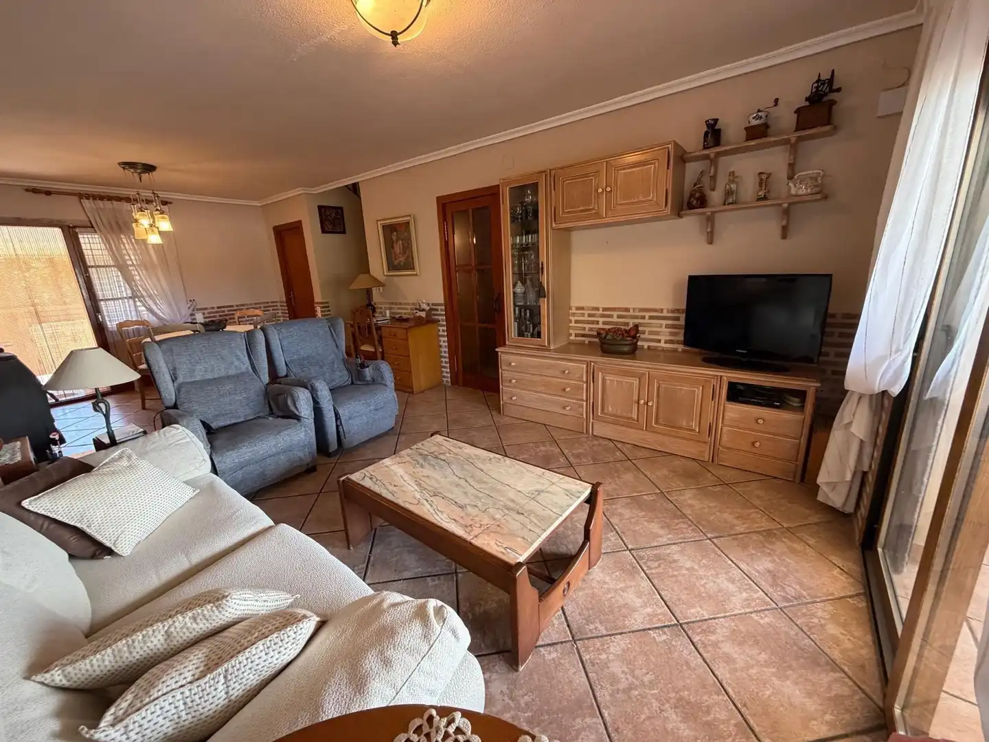 Sala d'estar de Casa o xalet de lloguer en Sagunto / Sagunt amb Aire condicionat, Jardí privat i Terrassa