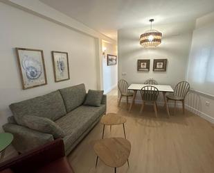 Living room of Flat for sale in  Huelva Capital  with Parquet flooring, Furnished and Oven