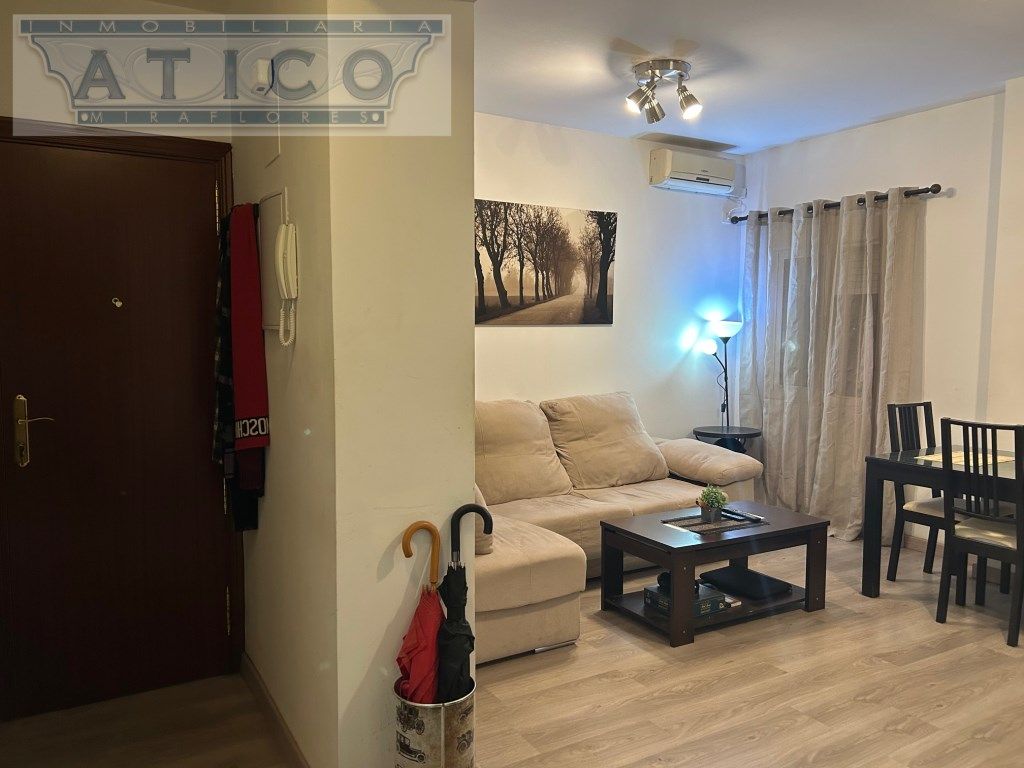 Living room of Flat for sale in  Sevilla Capital