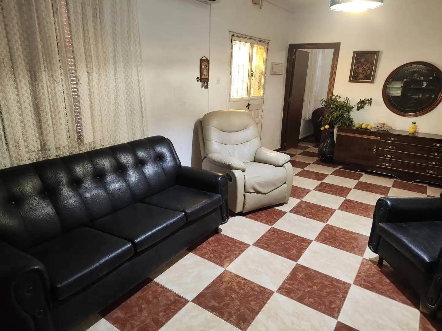 Sala de estar de Casa adosada en venta en Málaga con Aire acondicionado, Terraza y Amueblado