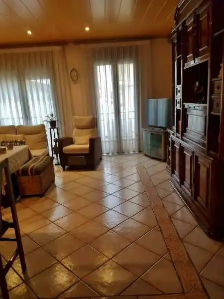 Sala d'estar de Casa o xalet de lloguer en Palamós amb Aire condicionat i Terrassa
