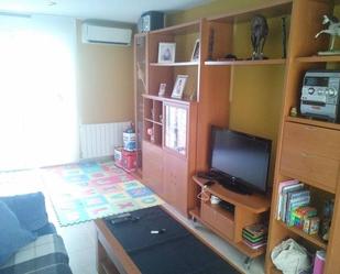 Sala d'estar de Casa adosada en venda en L'Alqueria d'Asnar amb Aire condicionat