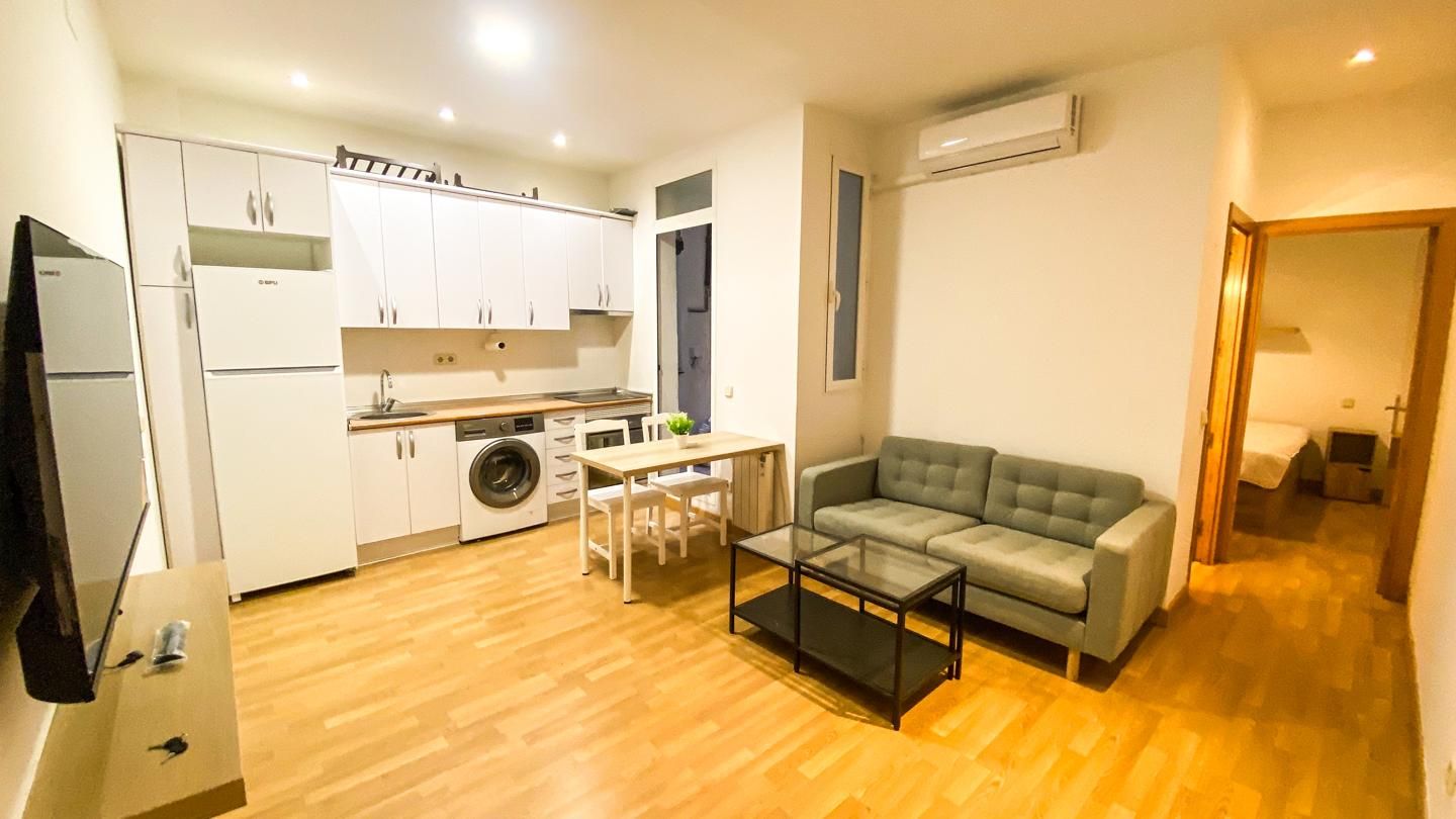 Living room of Planta baja to rent in  Madrid Capital  with Air Conditioner, Terrace and Furnished
