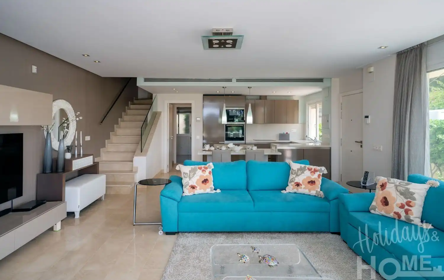 Sala d'estar de Pis de lloguer en Marbella amb Aire condicionat, Jardí privat i Terrassa