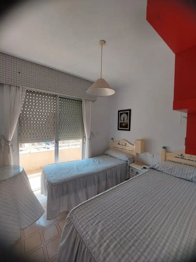 Habitación de Apartamento de alquiler en La Manga del Mar Menor con Terraza, Amueblado y Horno