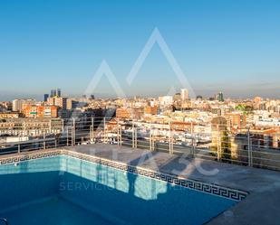 Swimming pool of Flat for sale in  Madrid Capital  with Air Conditioner