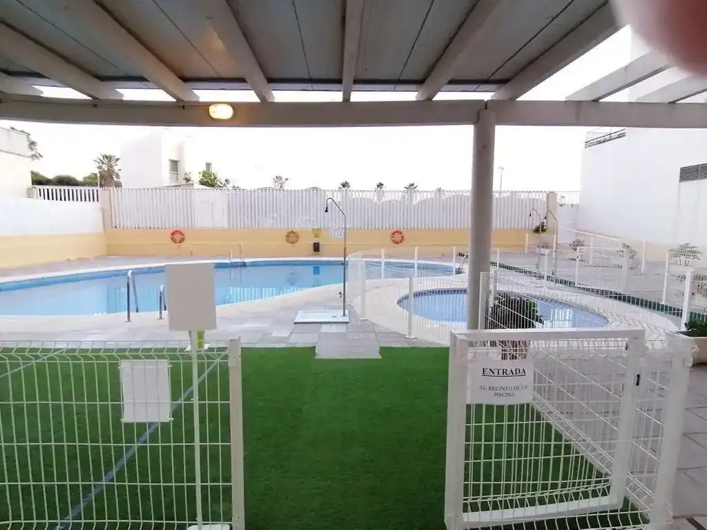Schwimmbecken von Wohnung zum Verkauf in Isla Cristina mit Schwimmbad