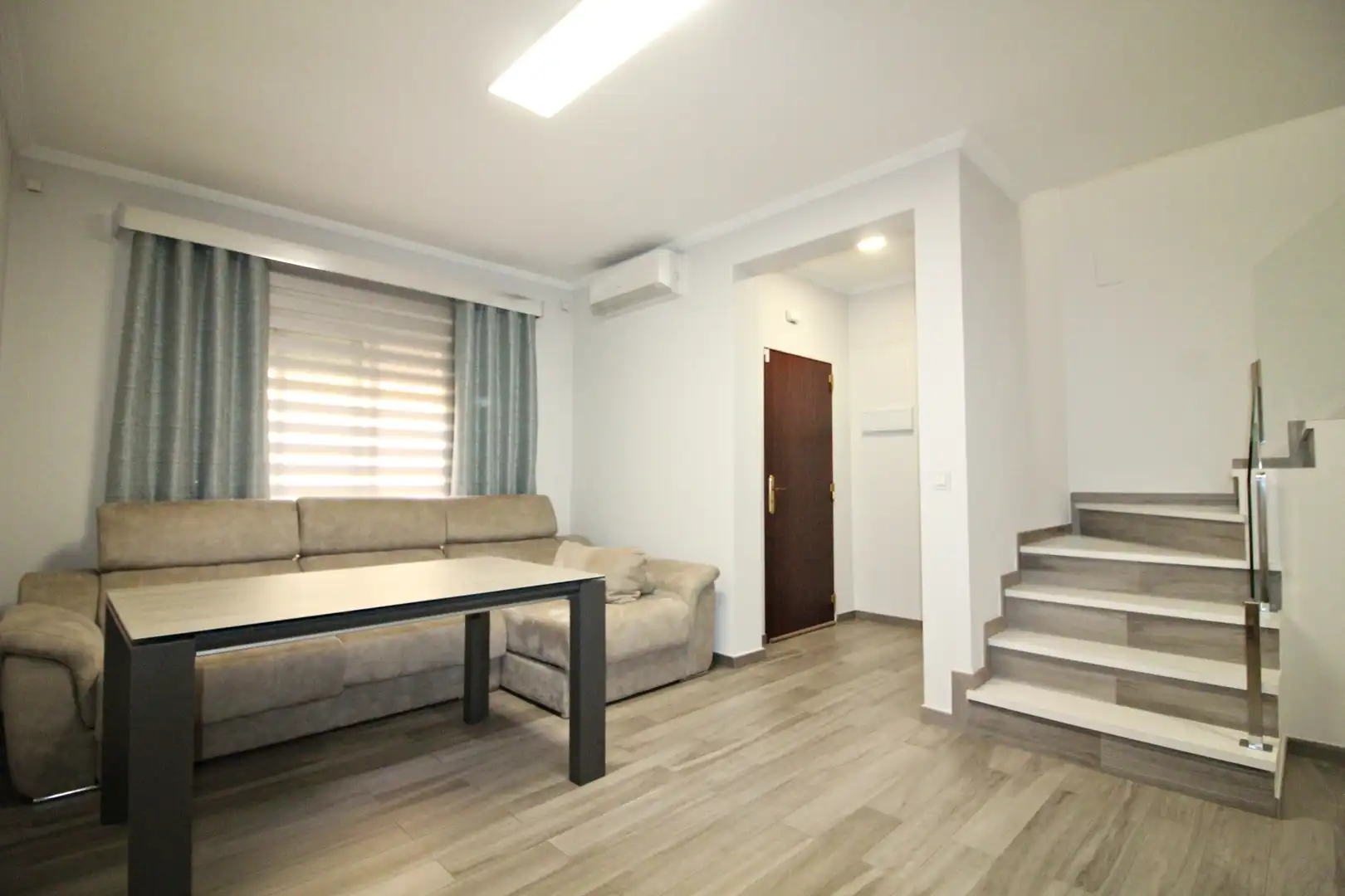 Sala de estar de Casa adosada en venta en San Juan del Puerto con Amueblado