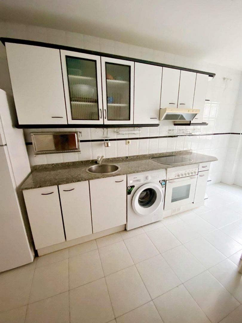 Kitchen of Apartment for sale in Gijón   with Parquet flooring, Storage room and Furnished