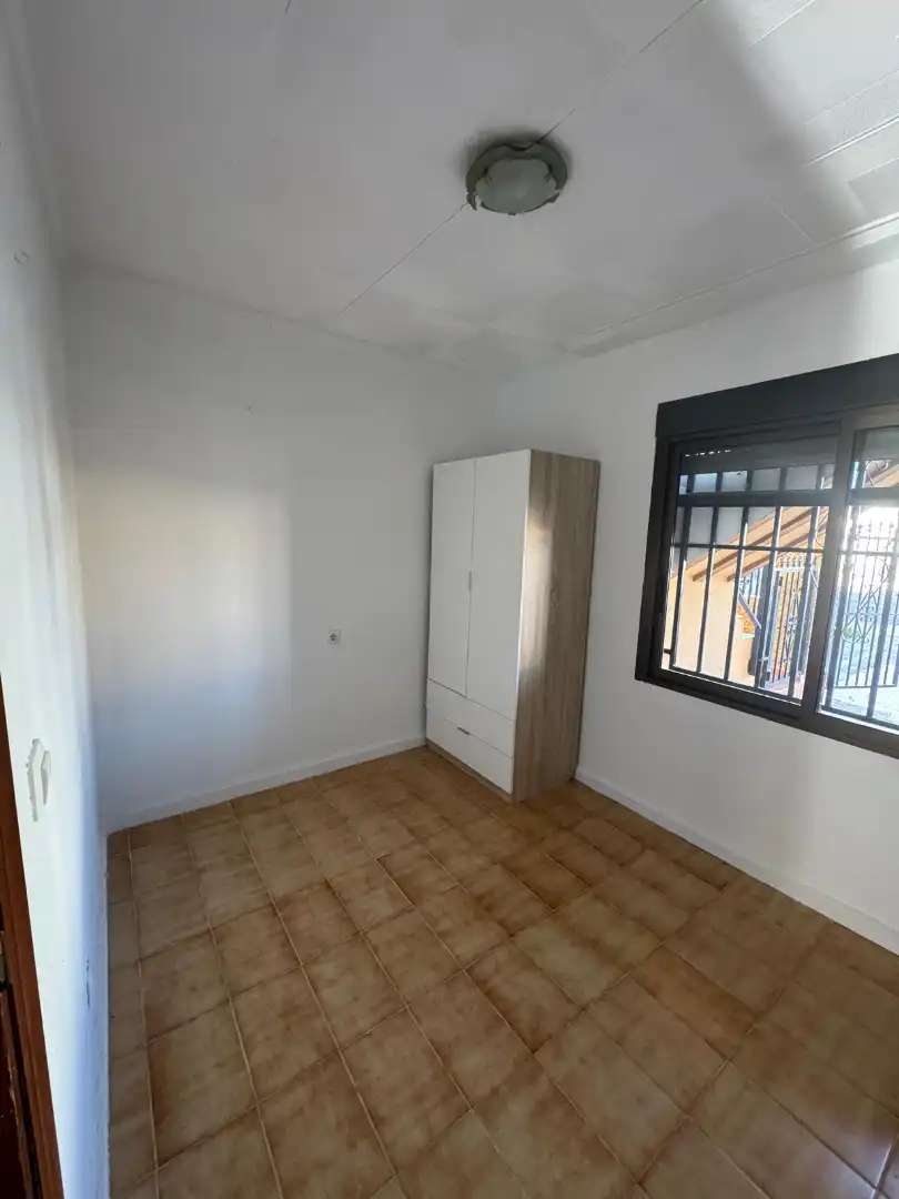 Dormitori de Casa adosada en venda en San Fulgencio amb Jardí privat, Terrassa i Moblat
