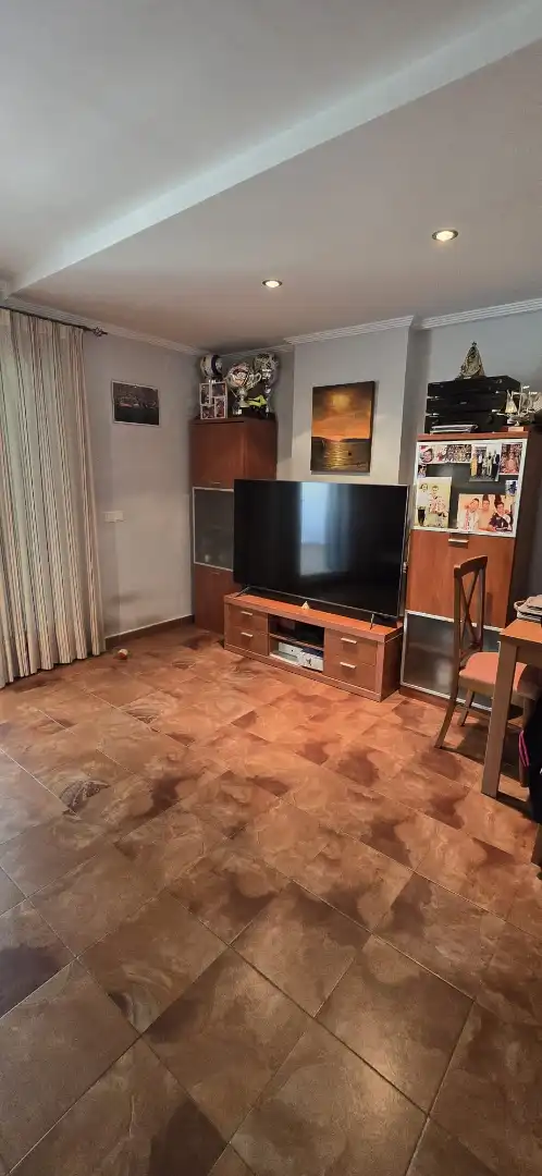 Sala de estar de Casa adosada en venta en El Portil con Calefacción, Trastero y Amueblado