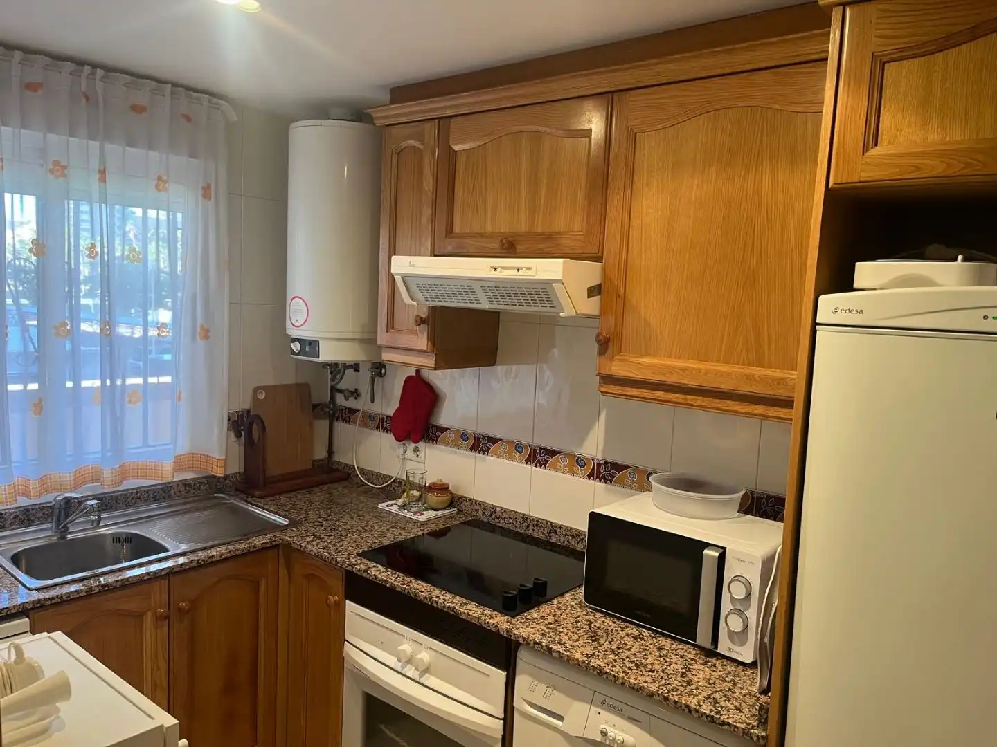 Kitchen of Flat for sale in Oropesa del Mar / Orpesa  with Air Conditioner, Terrace and Swimming Pool