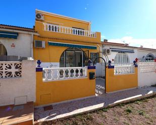 Exterior view of Single-family semi-detached for sale in Torrevieja  with Air Conditioner and Terrace