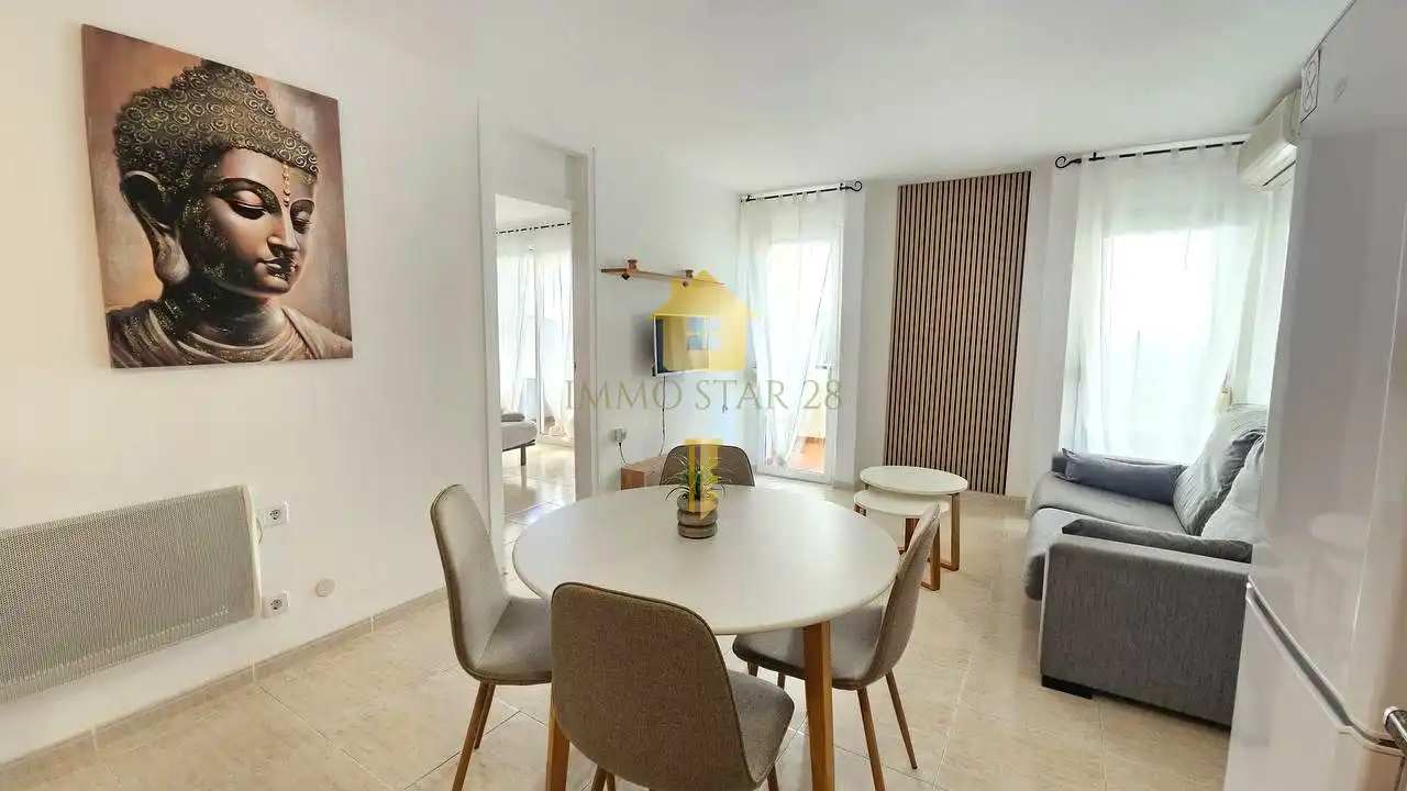 Sala d'estar de Planta baixa en venda en Roses amb Aire condicionat, Terrassa i Moblat