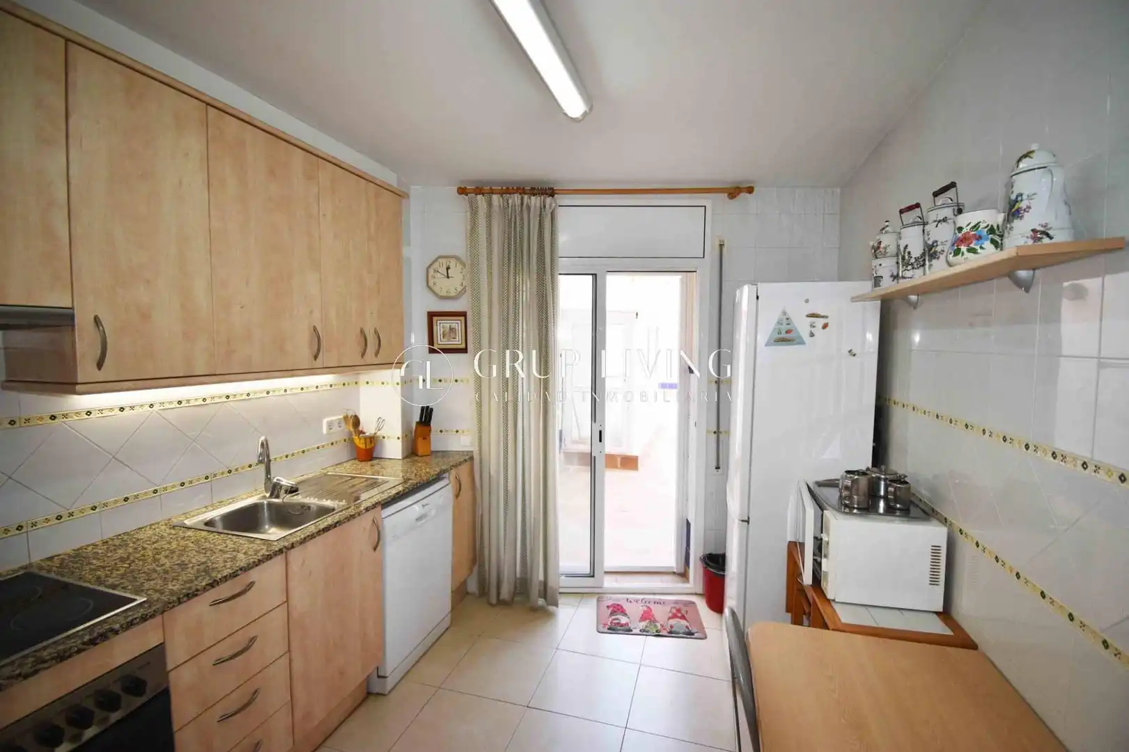 Cuina de Pis de lloguer en Sitges amb Aire condicionat, Calefacció i Terrassa