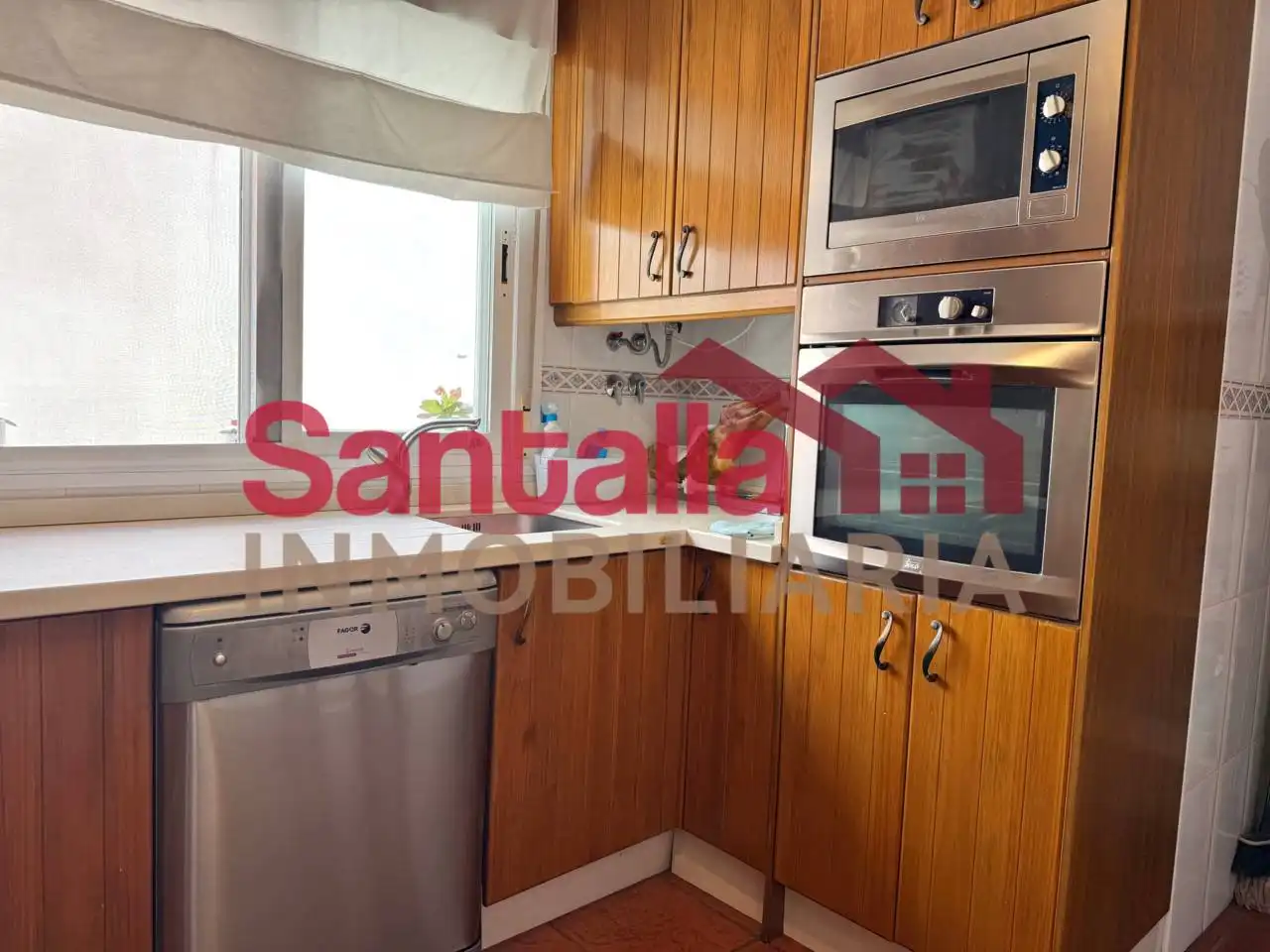 Cocina de Casa adosada en venta en Almuñécar con Aire acondicionado, Terraza y Piscina comunitaria
