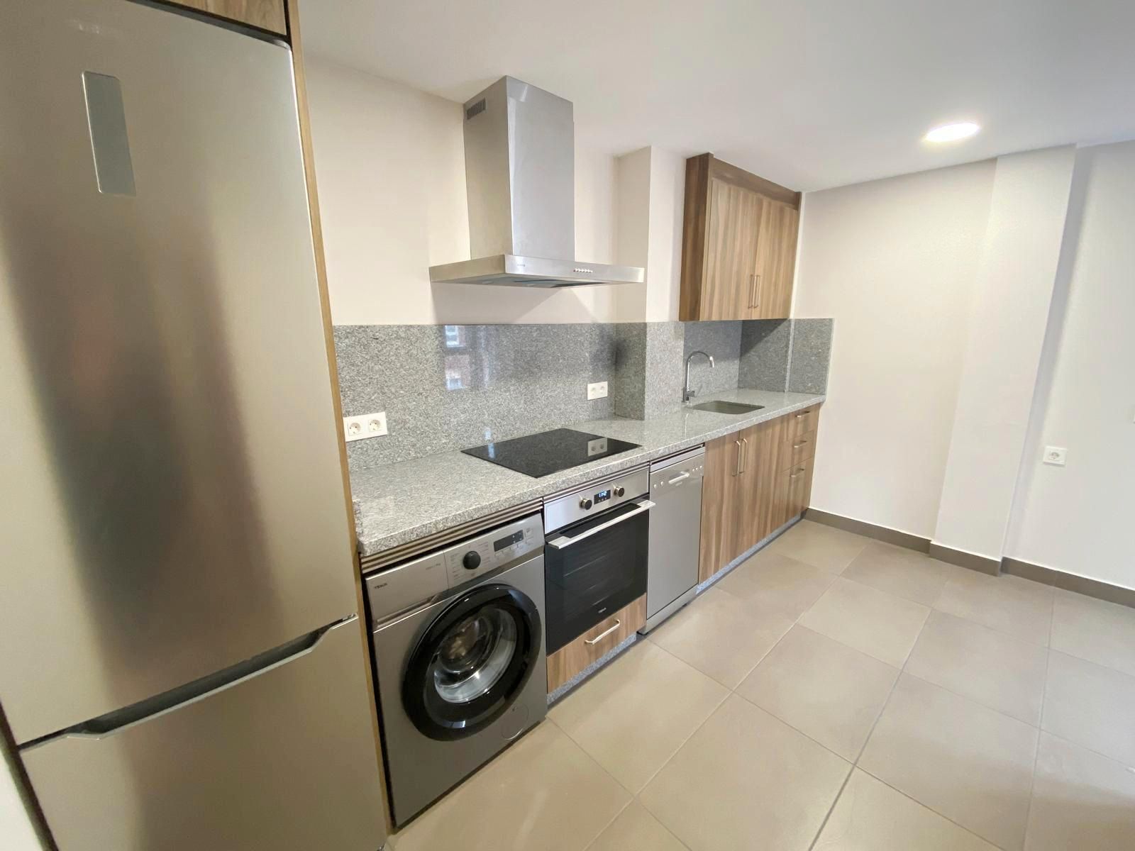 Kitchen of Flat for sale in Gijón   with Heating, Parquet flooring and Oven
