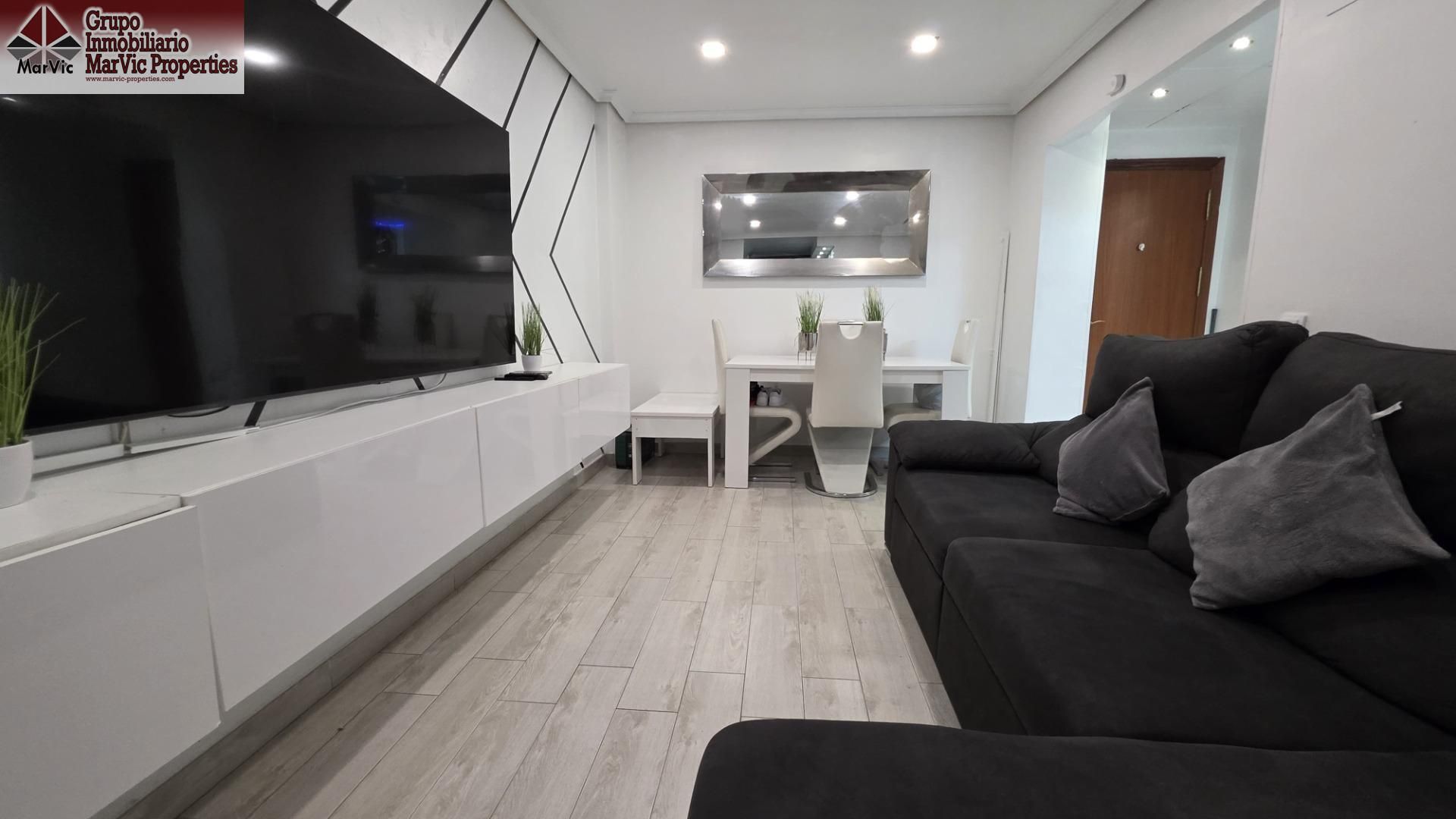 Sala de estar de Piso en venta en Benidorm con Aire acondicionado, Piscina y Piscina comunitaria