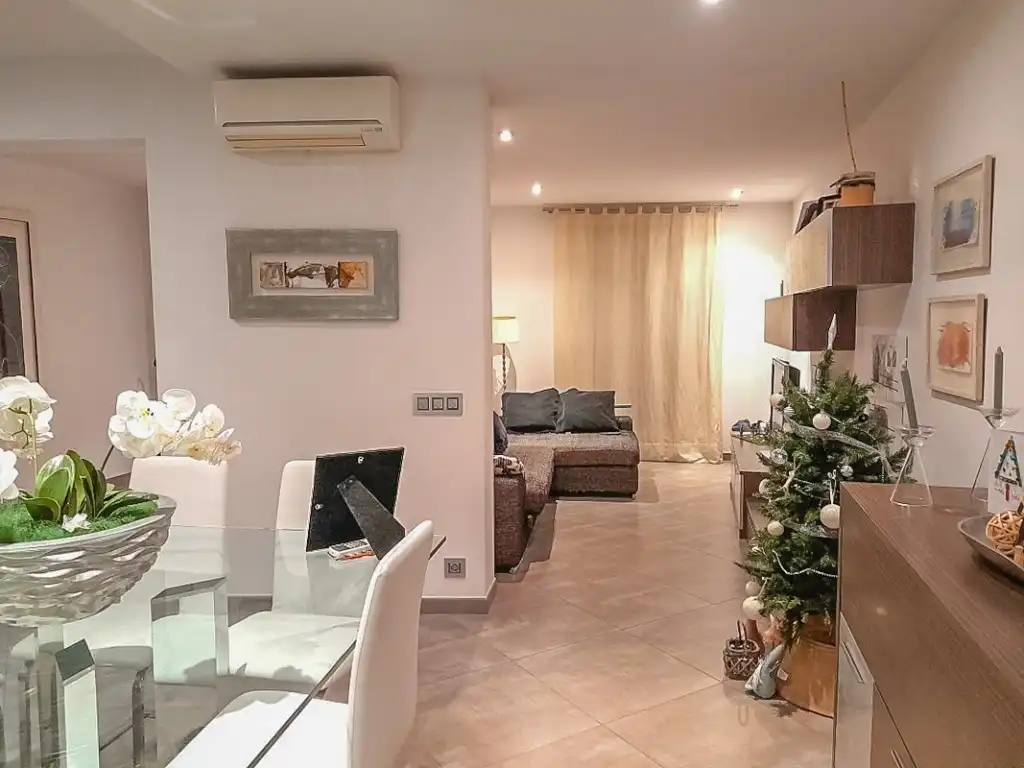 Sala d'estar de Casa adosada en venda en Pollença