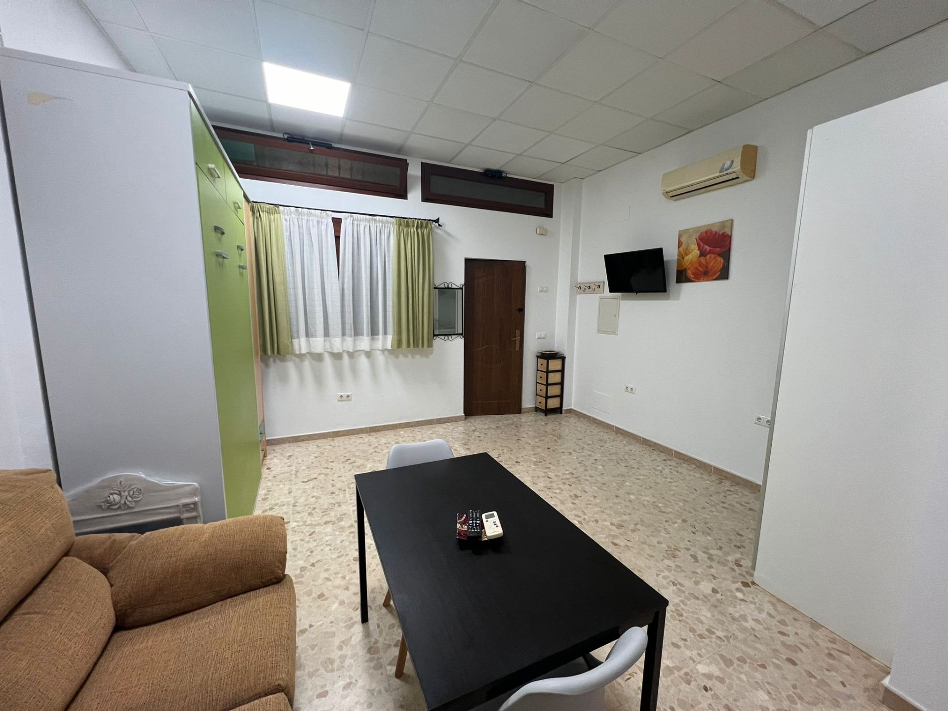 Sala de estar de Estudio de alquiler en Málaga Capital con Aire acondicionado y Amueblado