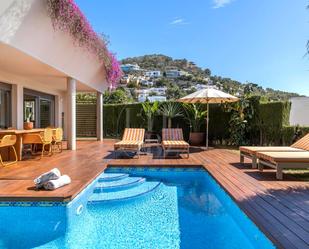 Piscina de Casa o xalet de lloguer en Santa Eulària des Riu amb Aire condicionat, Jardí privat i Terrassa