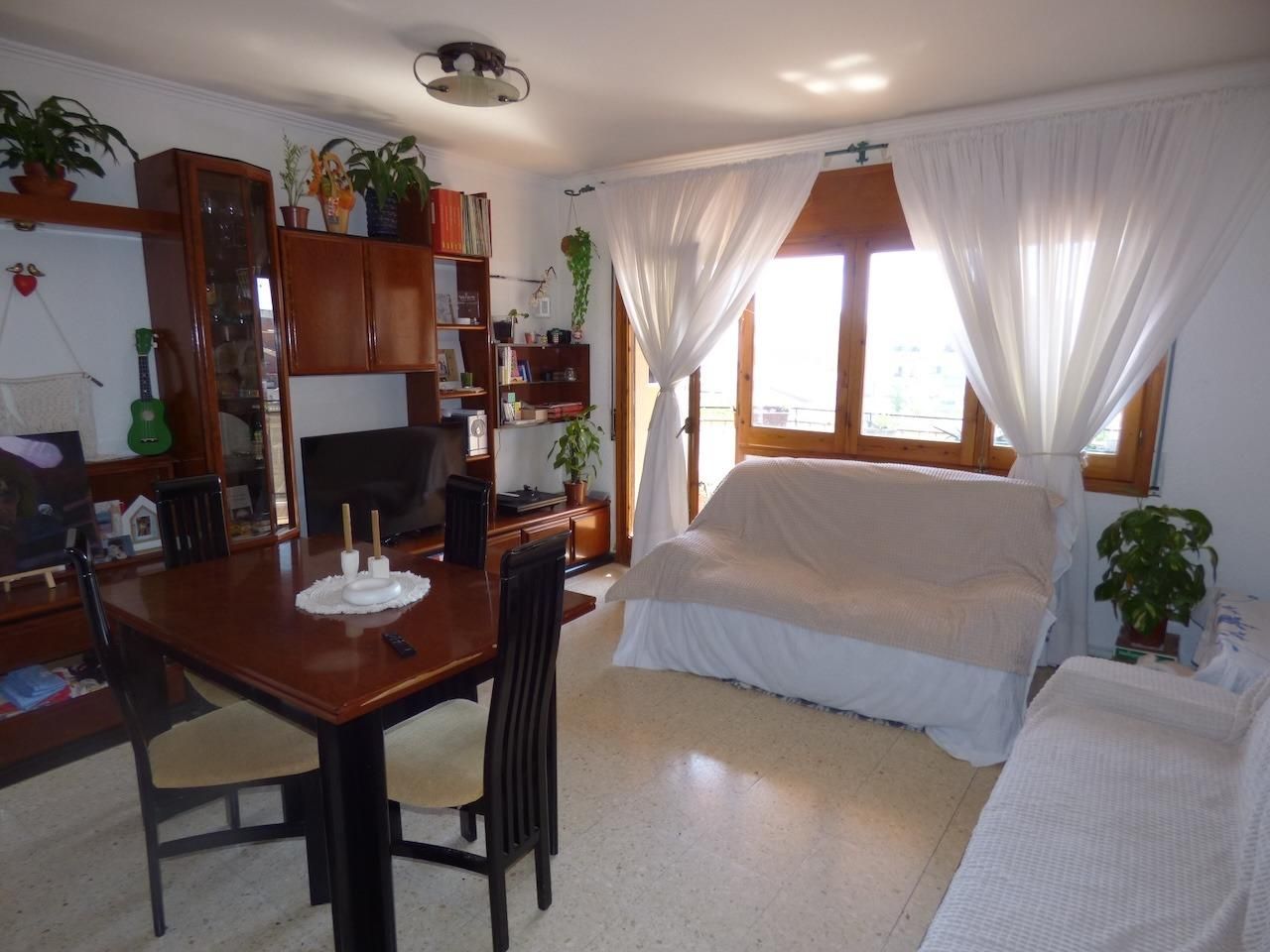 Wohnzimmer von Dachboden zum verkauf in Malgrat de Mar mit Heizung und Balkon