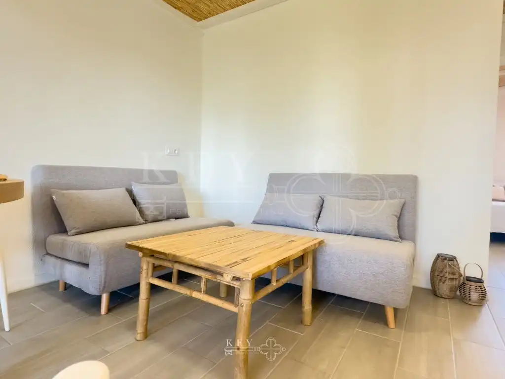 Sala d'estar de Apartament en venda en Ciutadella de Menorca amb Aire condicionat, Jardí privat i Piscina