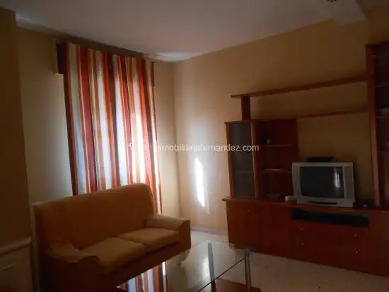 Living room of Flat for rent in Cáceres  with Heating, Terrace and Storage room