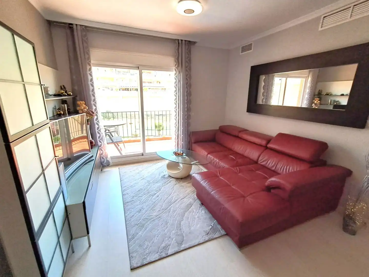 Sala d'estar de Apartament en venda en Benalmádena amb Aire condicionat, Calefacció i Piscina comunitària